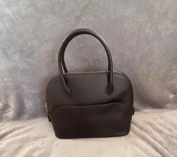 블랙 가죽 핸드백 지퍼 포함