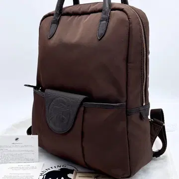 헌팅월드 백팩 가죽 로고 브라운 A4