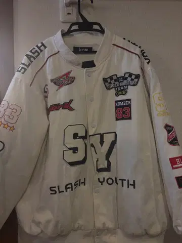 COM 도트컴 바시티 자켓