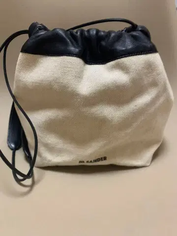 질 샌더 드로우 스트링 숄더백