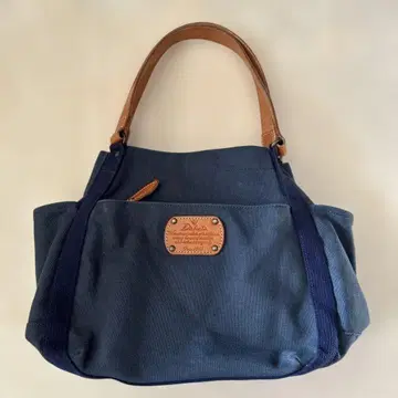 Dakota 다코타 피트 네이비 캔버스 가죽 토트백