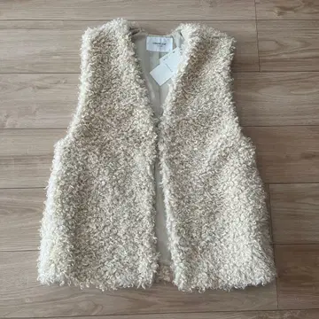 OPAQUE.CLIP 인조 모피 베스트