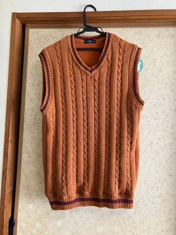 오렌지 케이블 짜임 슬리브리스 베스트