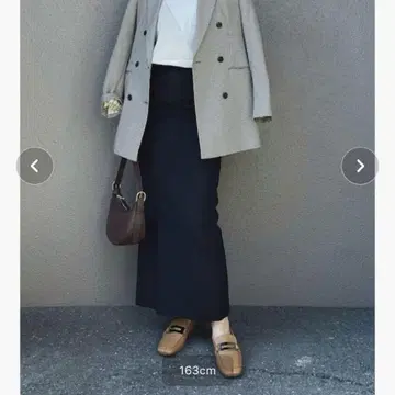 LOWRYS FARM 블랙 타이트 스커트 슬릿 포함