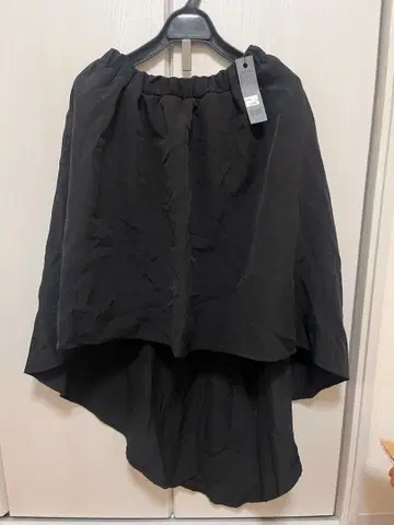 지나시스 비대칭 스커트 블랙