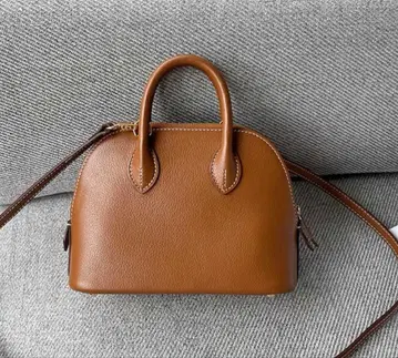 twenty vivo 천연 가죽 오렌지 골드 미니 숄더백