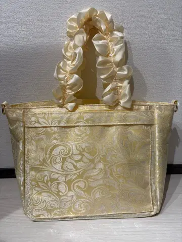 자카마트 이타백 페이즐리 핸들 프릴 토트백 아이보리