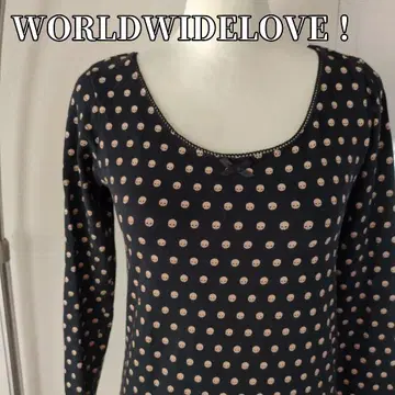 월드와이드 러브 스컬 올 패턴 긴팔 티셔츠 가운데 리본