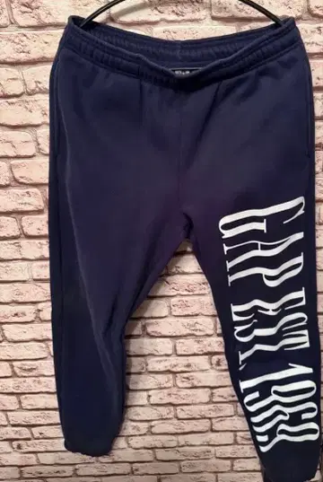 네이비 프린트 스웨트 팬츠