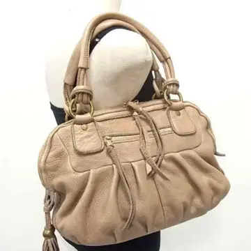 사자비 가죽 숄더백 태슬