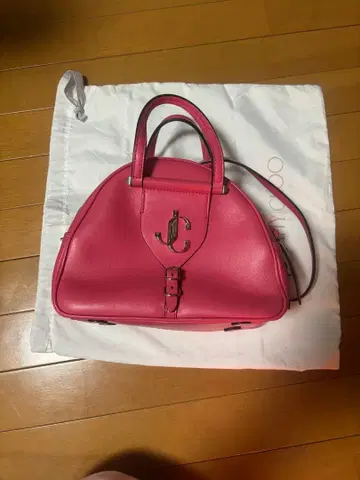 JC 로고 핑크 가죽 핸드백 지미추