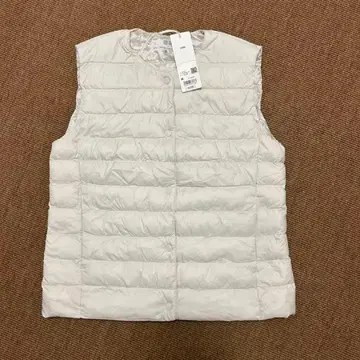 아이보리 퀼팅 컴팩트 베스트 M