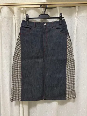 This Uniform Denim Pleat Skirt