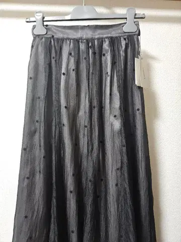 JUSGULITTY 도트 무늬 시스루 플레어 롱 스커트