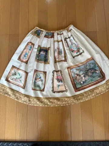 Innocent World 회화 프레임 플레어 스커트