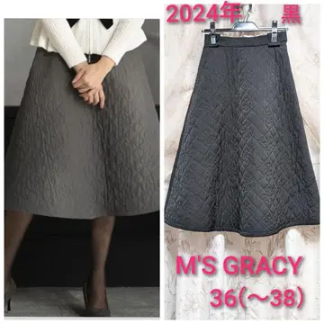 새상품급 엠즈 그레이시 36 퀼팅 플레어 스커트 까멜리아 x 리본 무늬