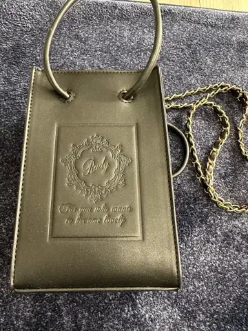 Rady 블랙 엠보싱 숄더백