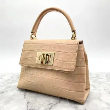 훌라 핸드백 가죽 엠보 베이지 골드 금장 장식