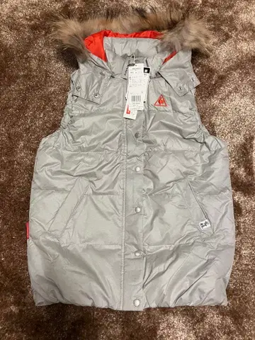 르꼬끄 스포르티브 여성용 다운 베스트 실버