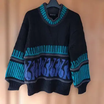 진사구자()의 기하학 패턴 긴팔 니트 스웨터