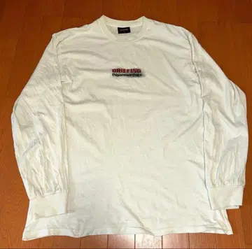 thisisneverthat x BRIEFING L/S 티셔츠
