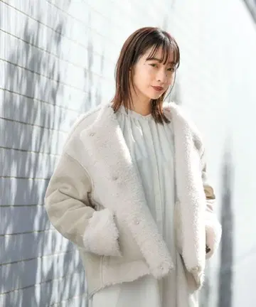 KBF 페이크 무스탕 패치워크 자켓