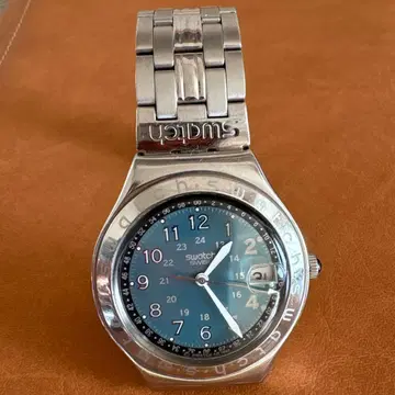 Swatch 아날로그 손목시계 스카이블루