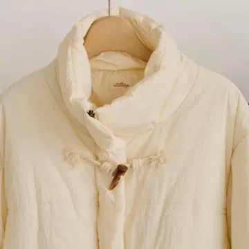 Unitage 충전솜 토글 단추 아우터