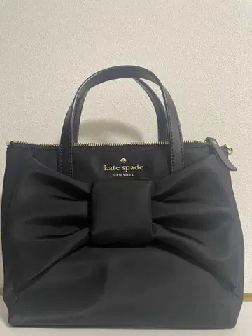 케이트 스페이드 블랙 핸드백 리본 디자인