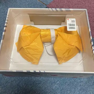 잎 무늬의 옐로우 컬러 오비