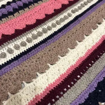 소재에 고집하는 손뜨개질 담요