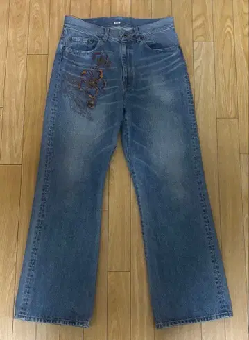 KHOKI Embroidered-design denim pants