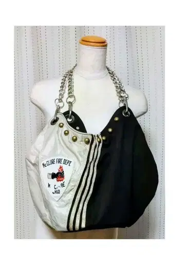 정글 캣 숄더백