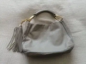 사자비 가죽 핸드백 그레이지 태슬 포함
