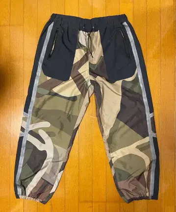 sacai KAWS Track Pants 'CAMO'