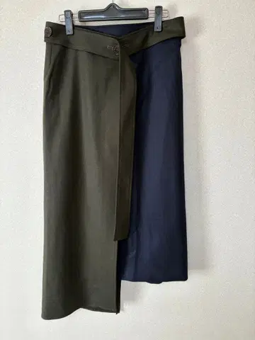 UNITEDAPROWS ASTRAET 비대칭 랩 스커트