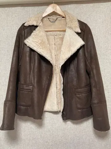 리플렉트 페이크 무스탕 자켓