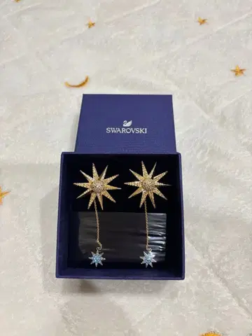 SWAROVSKI 별 모양 드롭 귀걸이