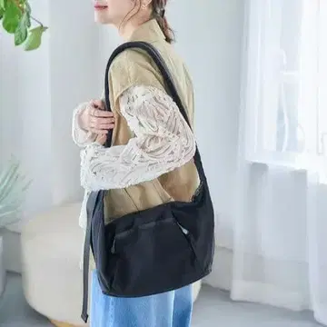 기쁨을 주는 메쉬 포켓 숄더백