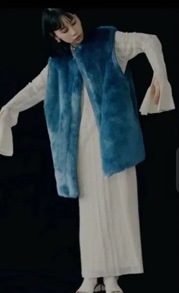 UND 리버서블 멜란지 퍼 베스트