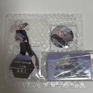 캡슐 복권 A.K.I. 아크릴 스탠드 & 메모장 & 캔뱃지 세트