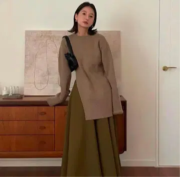 CLANE SLANT CUT KNITTOPS