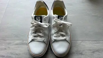 콜한 GP 탑스핀 스니커즈