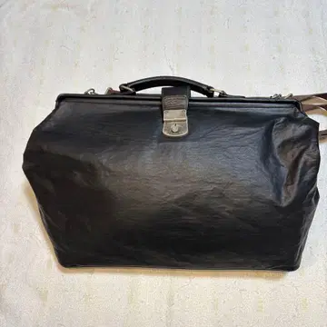 장 폴 고티에 블랙 레더 백