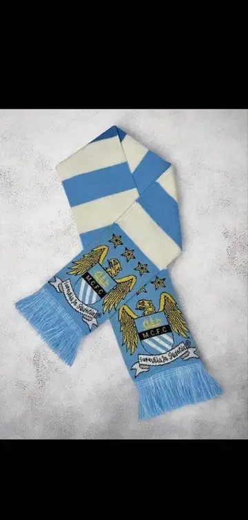 M.C.F.C. 엠블럼 머플러 라이트 블루