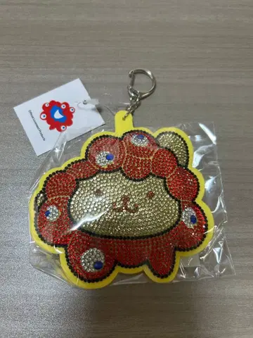 오사카 엑스포 산리오 변신 반짝이 가죽 키링 폼폼푸딩