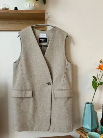 FAbRICA 베이지 슬리브리스 베스트