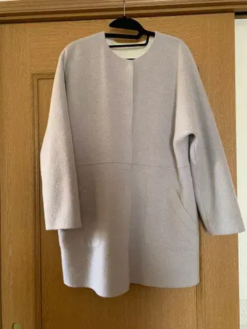 그린 라벨의 리버서블 코트