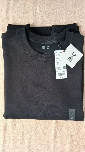 유니클로 오버 사이즈 맨투맨 M 사이즈 블랙