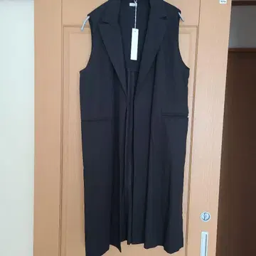 블랙 롱 베스트 포켓 부착